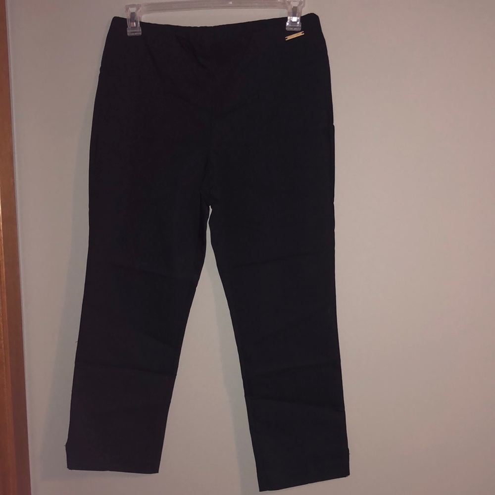 BRAND NEW WOMAN PANTS SIZE 10! NEW WITH TAGS ON IT! SMOKE FREE HOME!